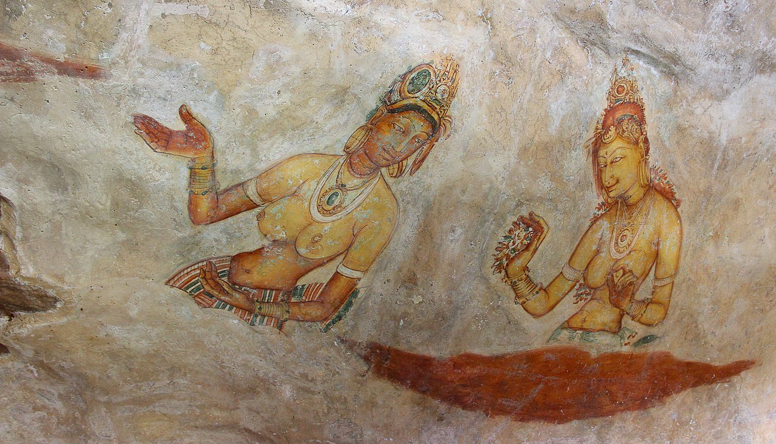 Frescoes inside Lion Rock (via Peter van der Sluijs, Wikimedia Commons).